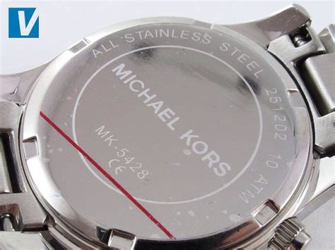 how to spot fake michael kors watch|michael kors watch spotting.